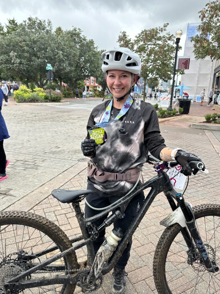 Candice at the finish line of 2023 Little Sugar MTB Race